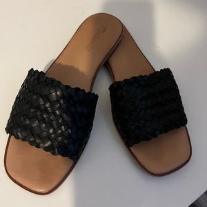 Black leather slides
